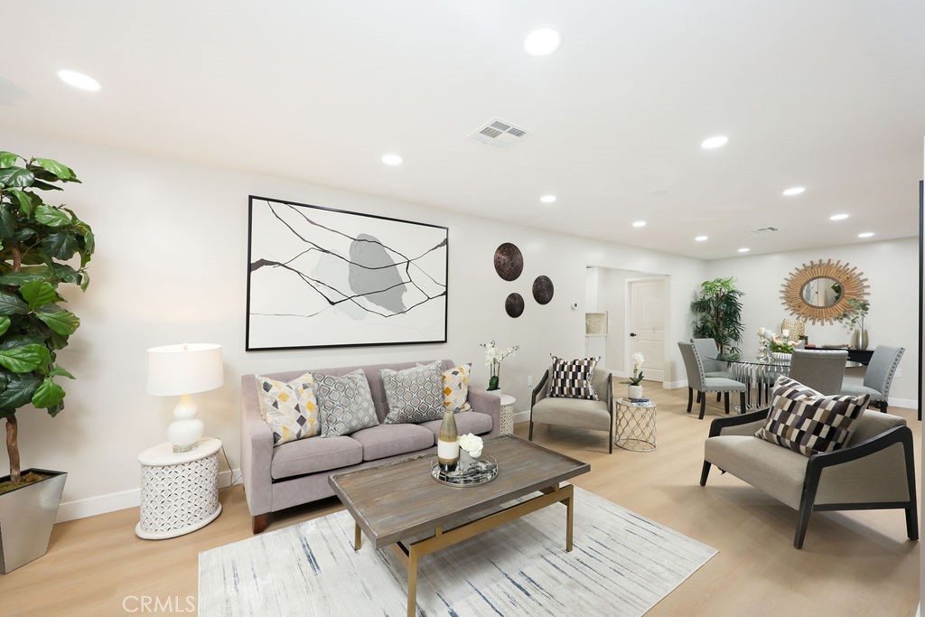 916 North West Street Anaheim, CA 92801 - Photo 13 of 27 a living room with furniture and a potted plant