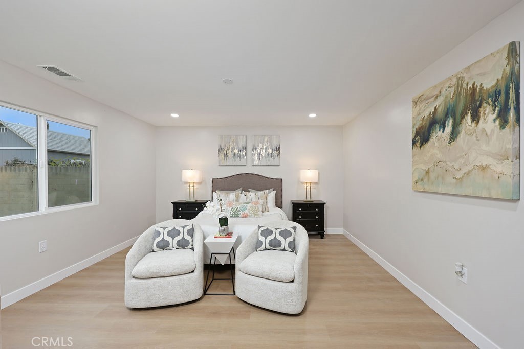 916 North West Street Anaheim, CA 92801 - Photo 18 of 27 a bedroom with bed and a large window