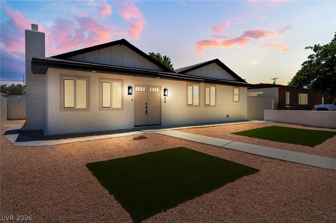 39 Lowery Street Henderson, NV 89015 - Photo 40 of 40 A striking facade with prominent gables and clean lines creates inviting curb appeal.