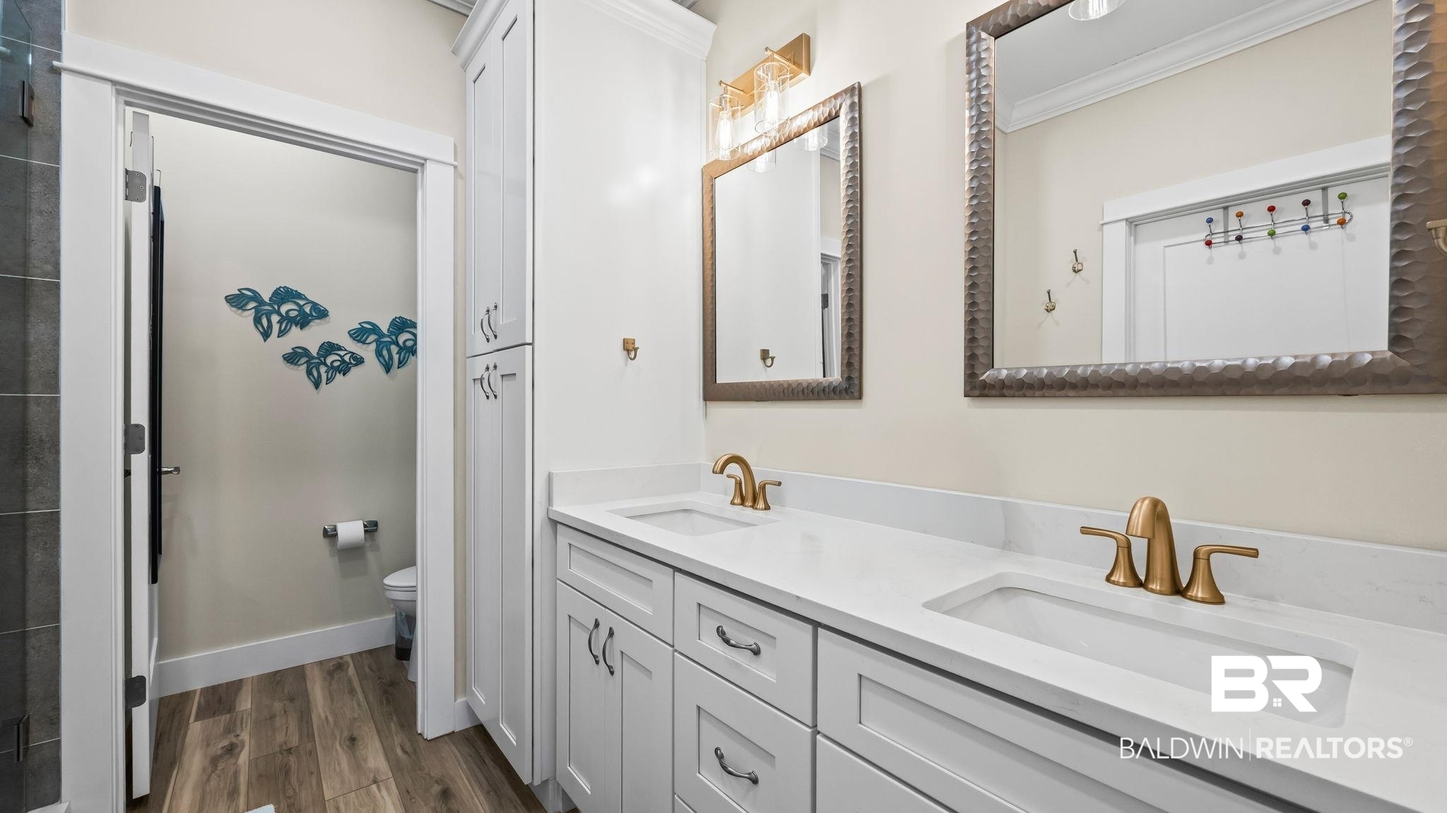 8013 Carmel Circle Foley, AL 36535 - Photo 26 of 49 Full bathroom with double vanity, ornamental molding, and dark wood-style floors