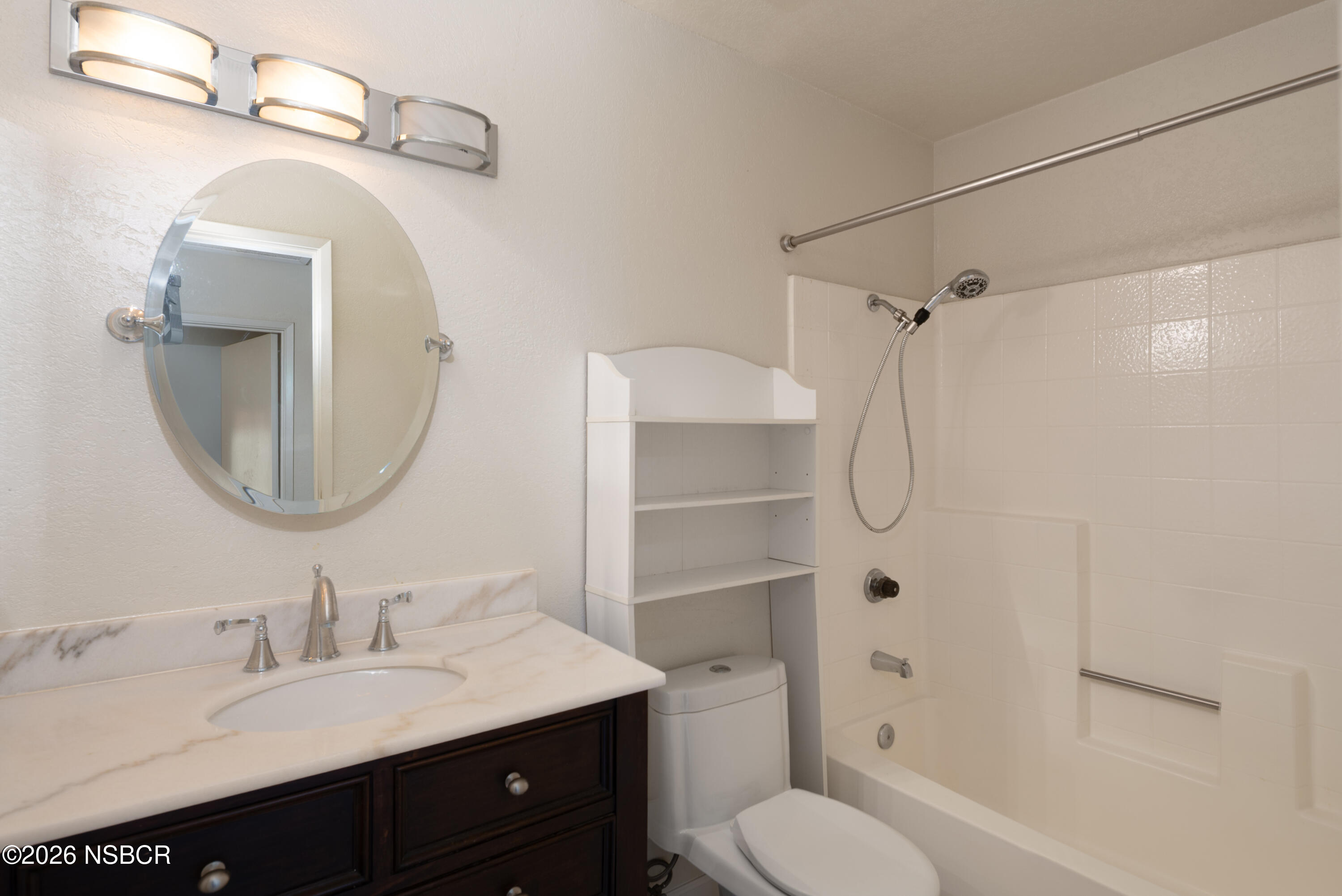 545 Santa Cruz Court Santa Maria, CA 93455 - Photo 23 of 28 a bathroom with a granite countertop sink toilet and shower