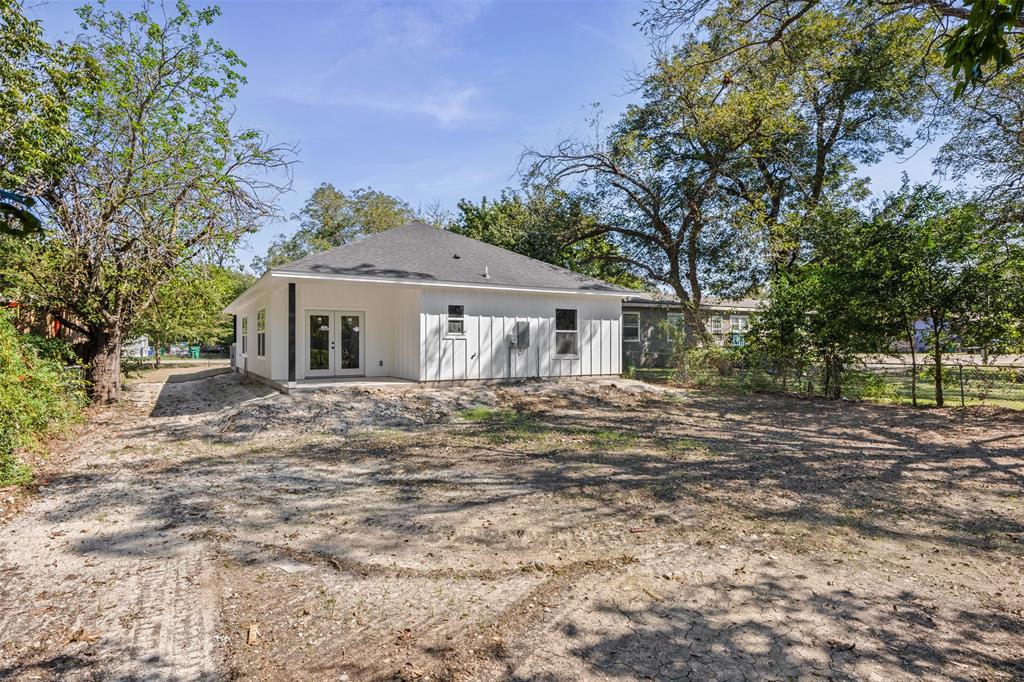 506 2nd Street Moody, TX 76557 - Photo 32 of 40 a front view of a house with a garden