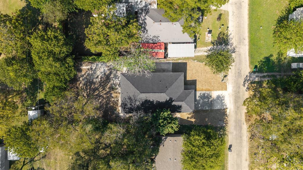 506 2nd Street Moody, TX 76557 - Photo 33 of 40 an aerial view of residential house with outdoor space and trees all around