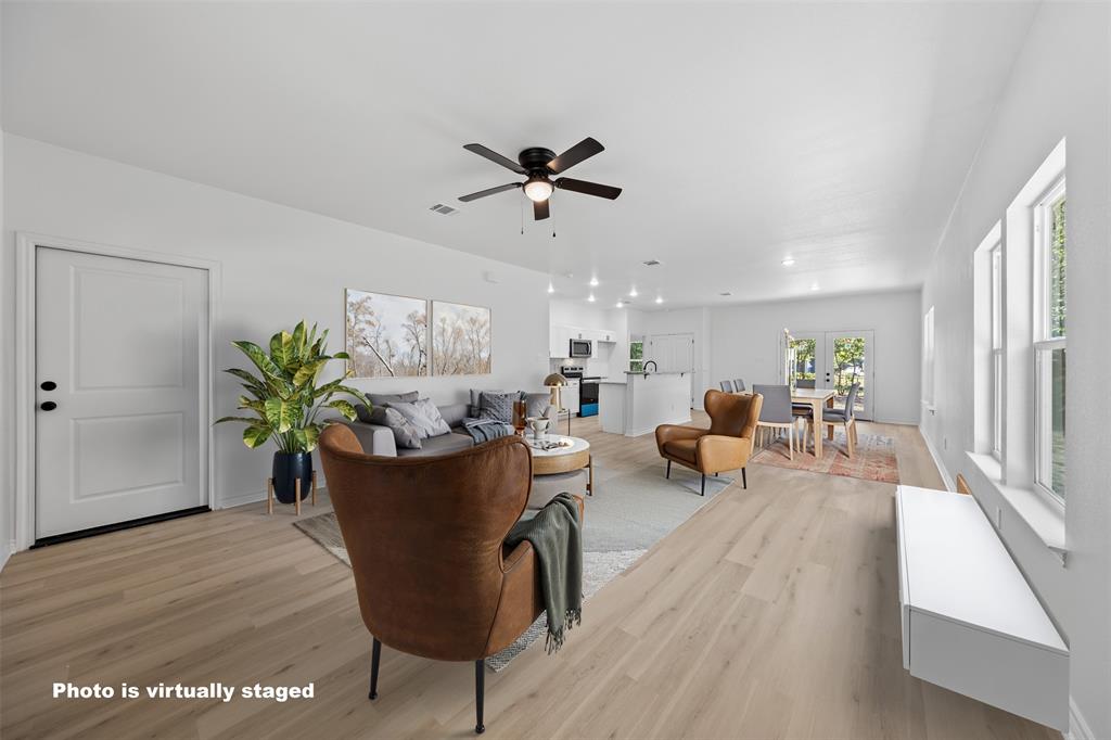 506 2nd Street Moody, TX 76557 - Photo 6 of 40 a living room with furniture potted plant and a window