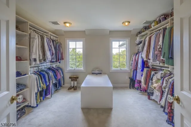 a bed room with a bed and a window