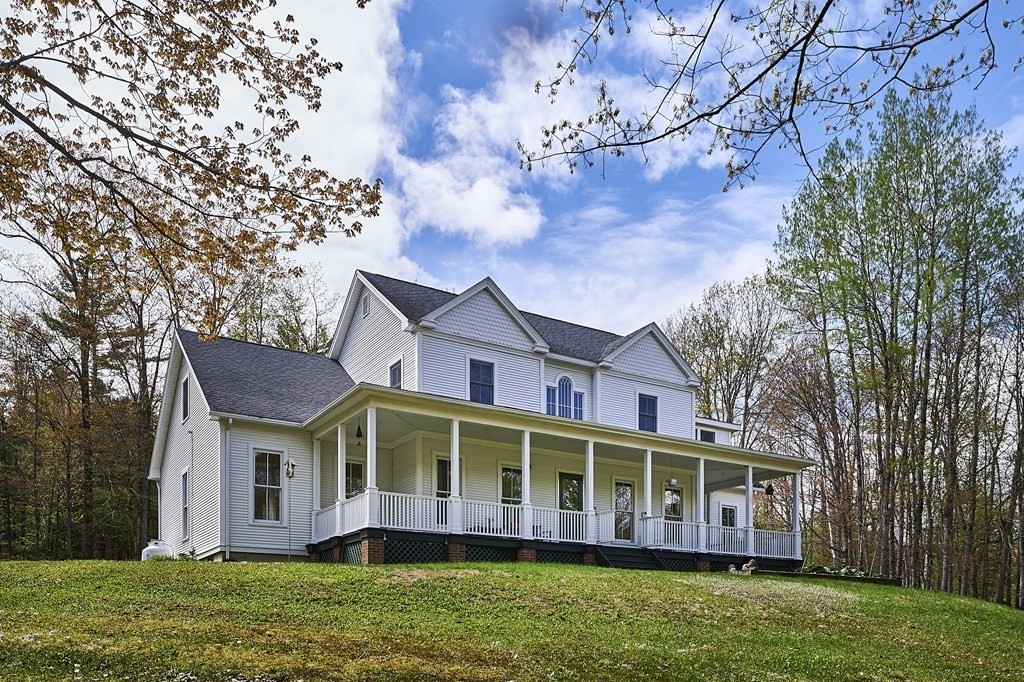 1700 Main Poland Road Conway, MA 01096 - Photo 1 of 42 a view of a house with a garden and trees