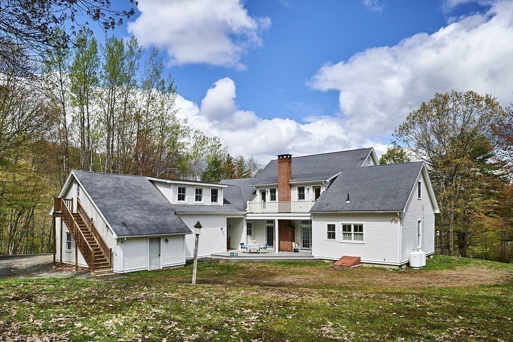 1700 Main Poland Road Conway, MA 01096 - Photo 4 of 42 a house with swimming pool in front of it