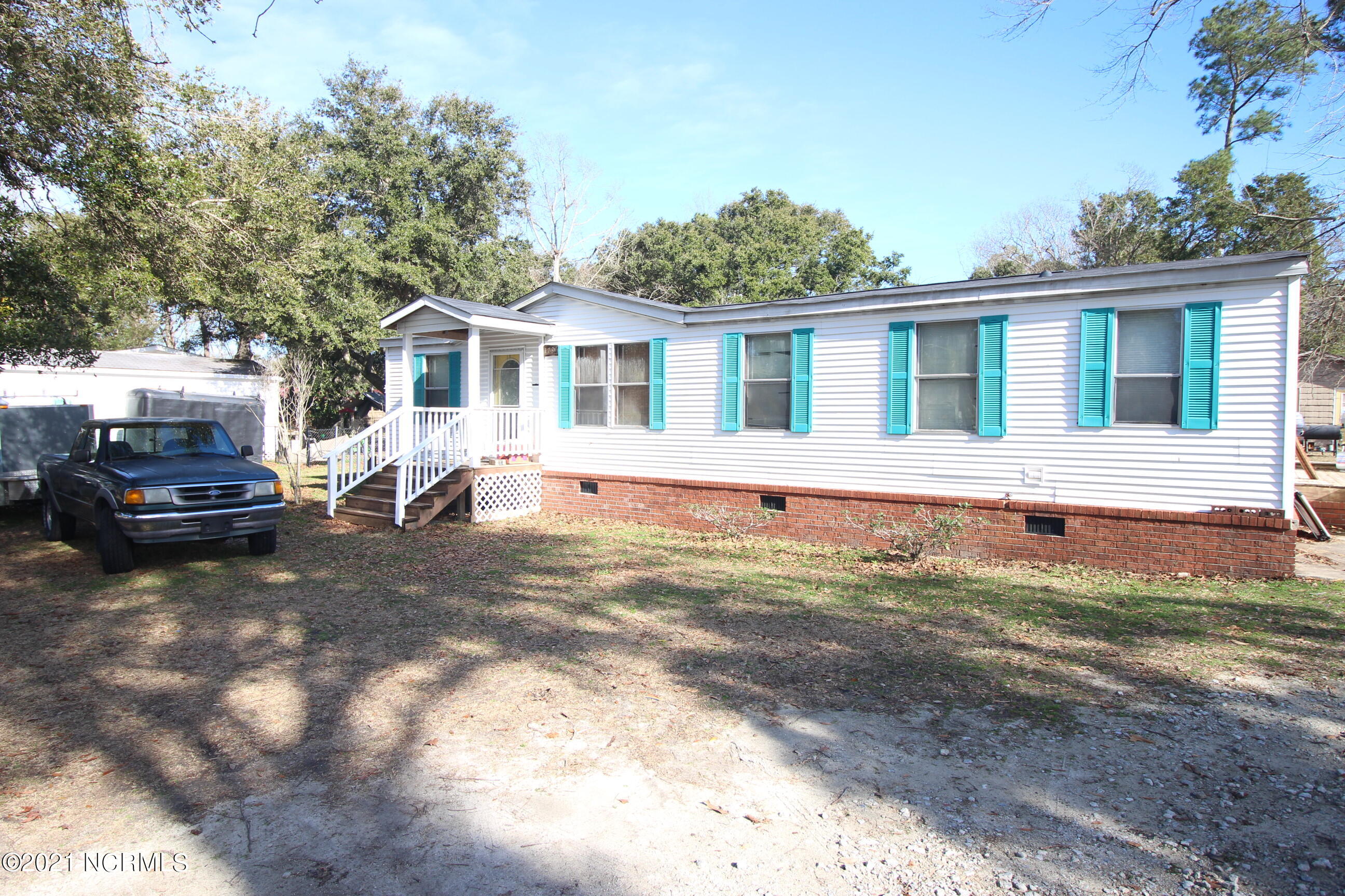 1794 Sloop Point Loop Road Hampstead, NC 28443 - Photo 2 of 14 IMG_1079