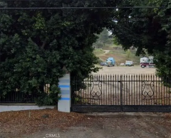 a view of a wrought iron fences in front of house