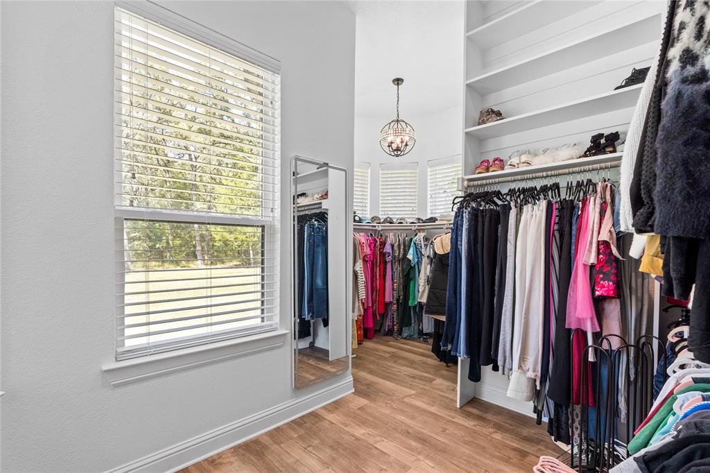 6707 Anchor Quinlan, TX 75474 - Photo 23 of 40 One of TWO huge walk-in closets with decorative light and windows