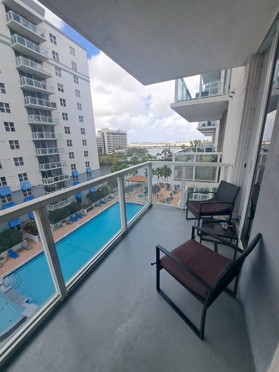 5077 Northwest 7th Street, Unit 912 Miami, FL 33126 - Photo 6 of 28 a sitting area with furniture and city view