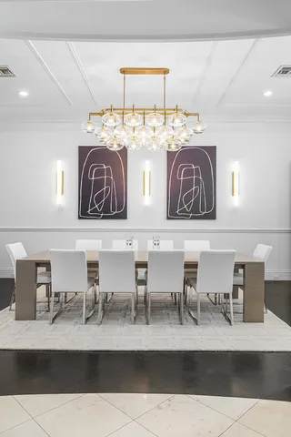 a kitchen with stainless steel appliances granite countertop a stove and a large window