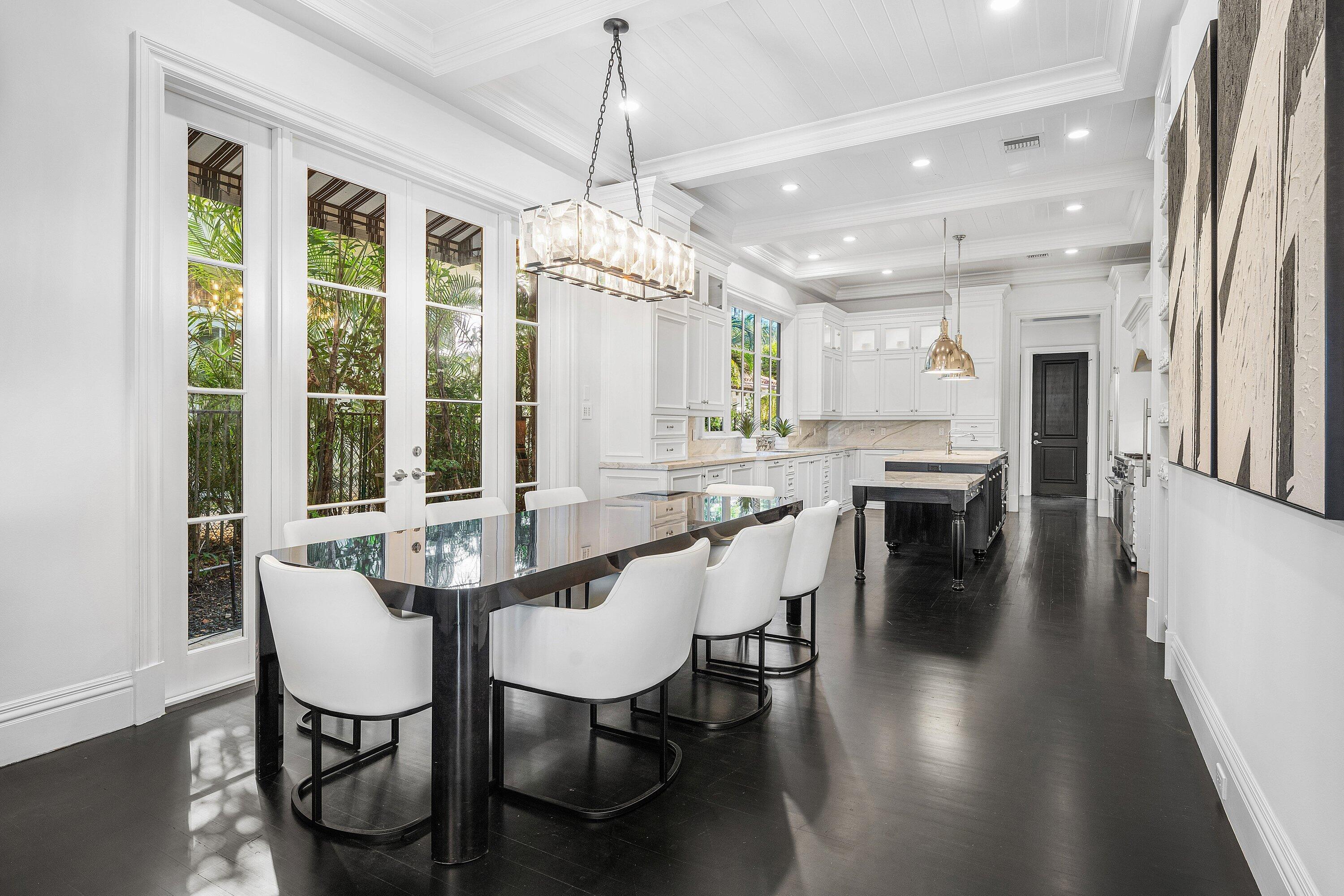 485 Northeast Spanish Trail Boca Raton, FL 33432 - Photo 19 of 76 a view of a dining room with furniture window and outside view
