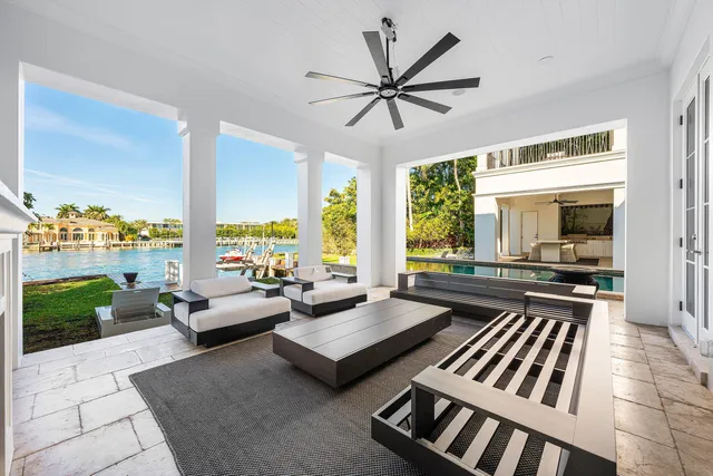 a bathroom with a toilet a sink and shower