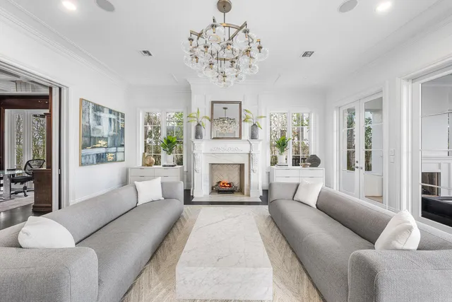 a large bathroom with a large tub and sink