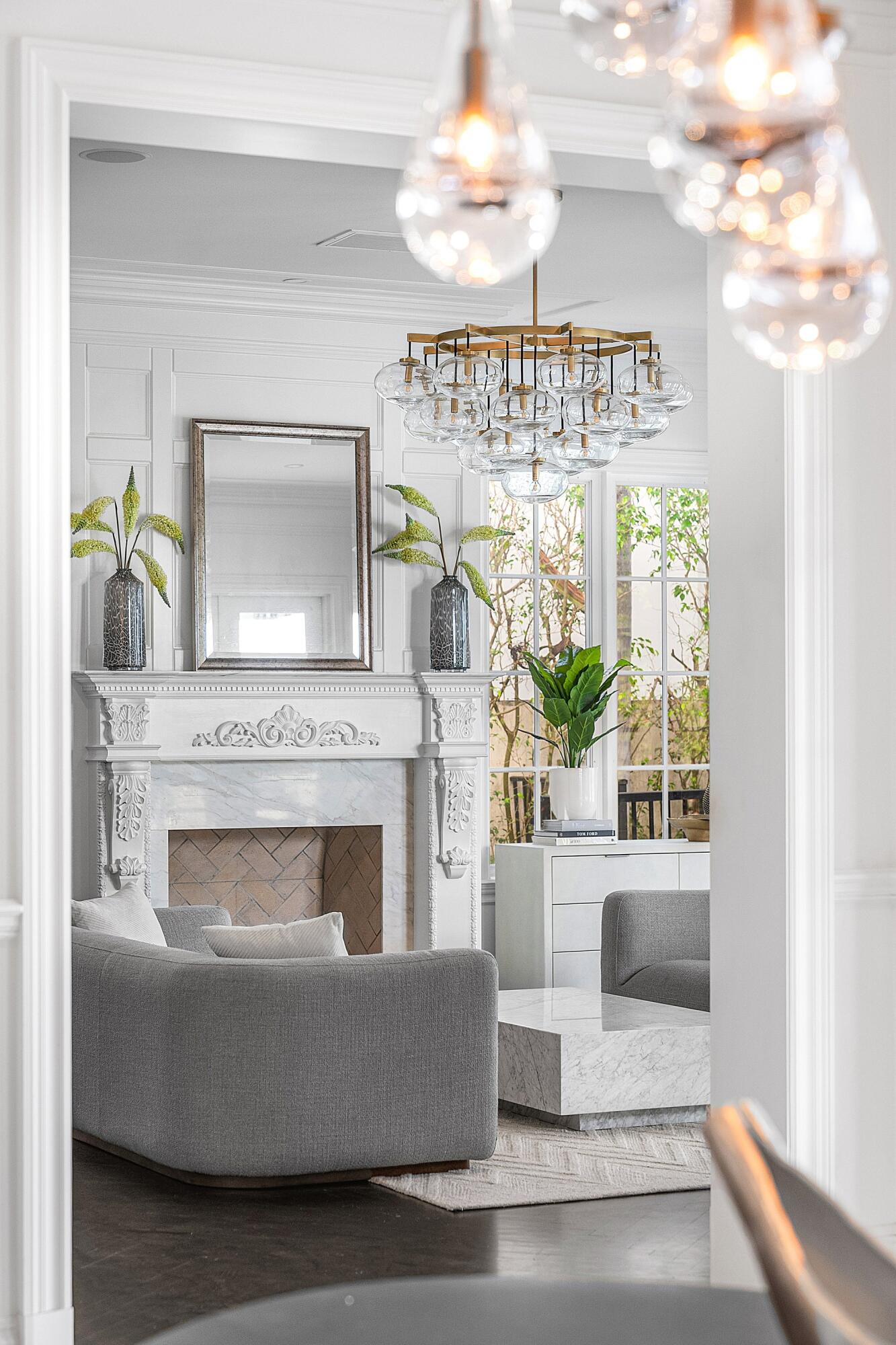 485 Northeast Spanish Trail Boca Raton, FL 33432 - Photo 39 of 76 a living room with furniture and a fireplace