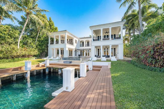 a view of a dining room with furniture and window