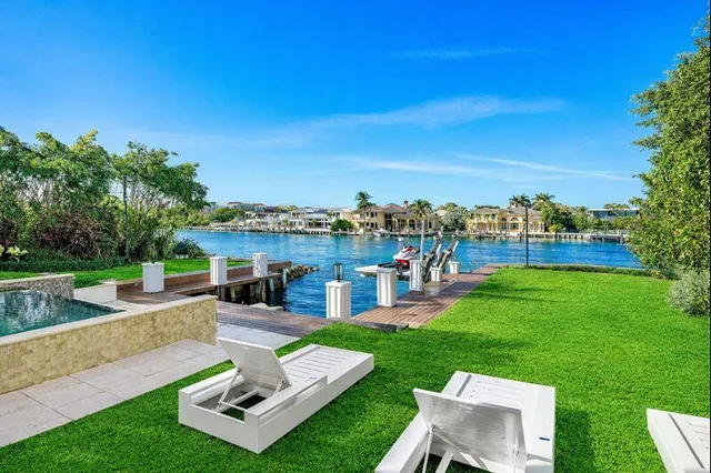a dining room with wooden floor and breakfast area