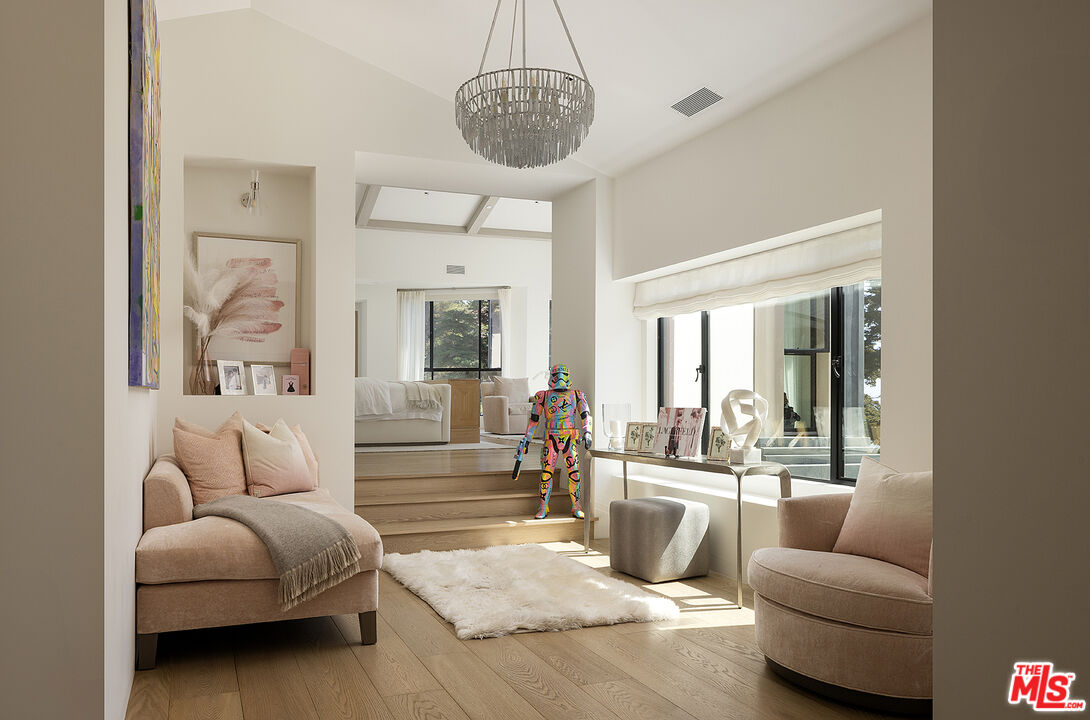 4145 Creciente Drive Santa Barbara, CA 93110 - Photo 22 of 57 a living room with furniture and a large window