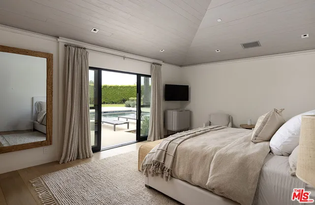 a kitchen with a table and chairs in it