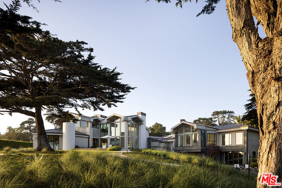 4145 Creciente Drive Santa Barbara, CA 93110 - Photo 39 of 57 a front view of a house with a garden
