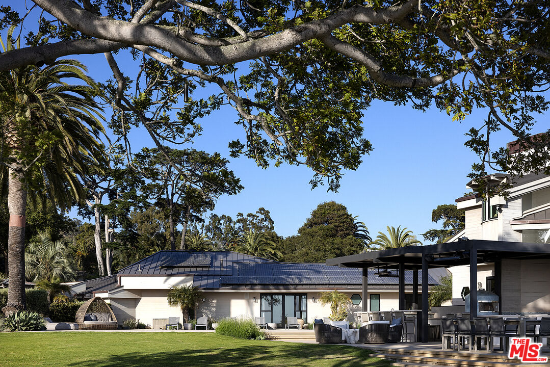 4145 Creciente Drive Santa Barbara, CA 93110 - Photo 43 of 57 a front view of a building with a garden