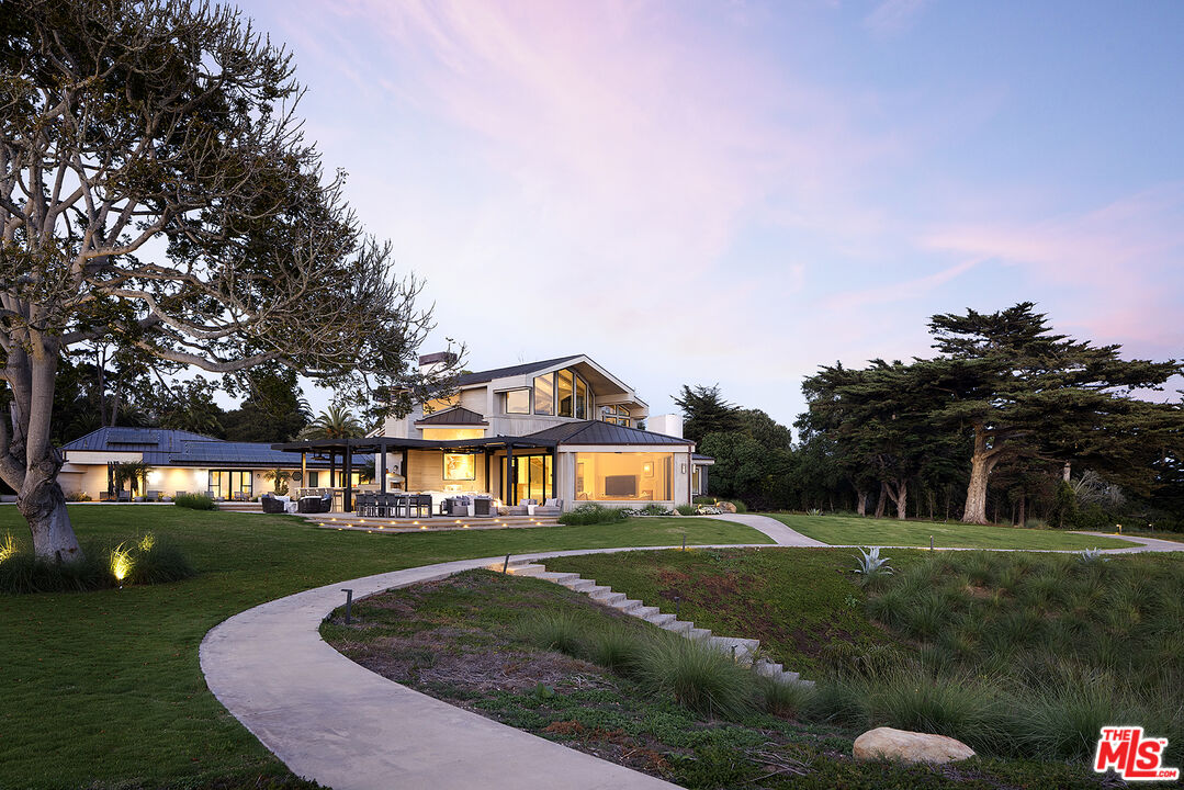 4145 Creciente Drive Santa Barbara, CA 93110 - Photo 49 of 57 a front view of a house with a yard
