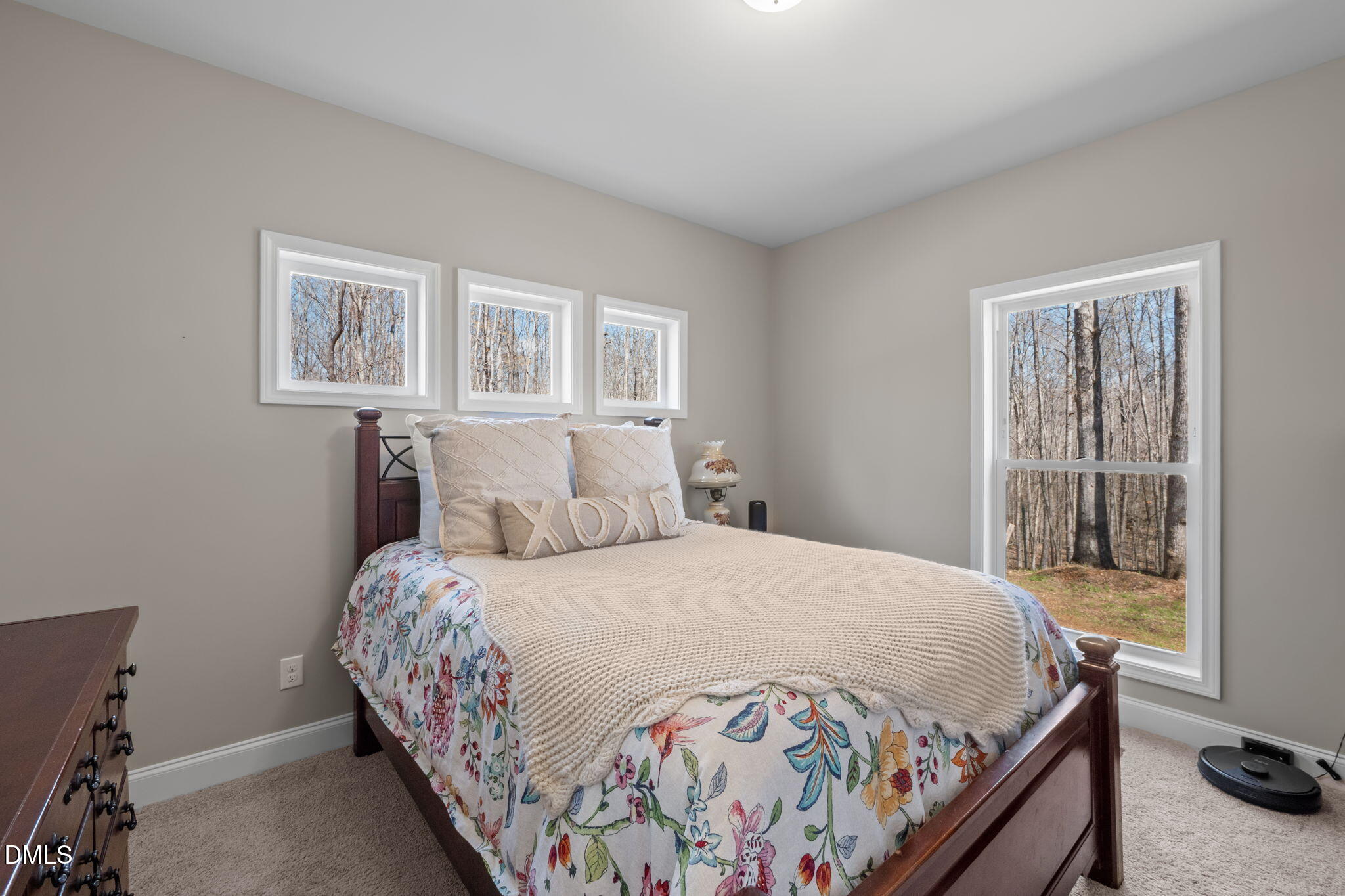 8514 Charlie Stovall Road Roxboro, NC 27574 - Photo 25 of 48 a bedroom with a bed and a window