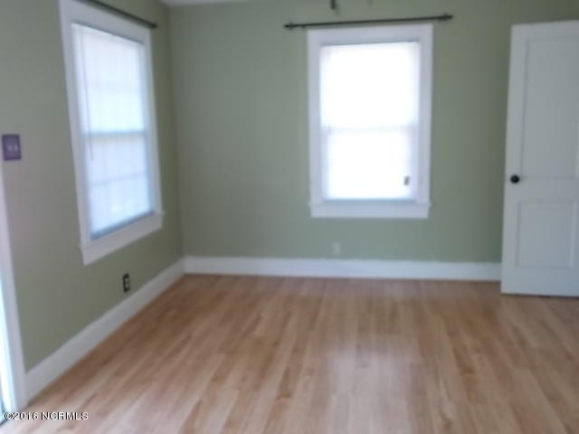 2690 Mark N Smith Road Deep Run, NC 28525 - Photo 2 of 10 Great room with laminate flooring