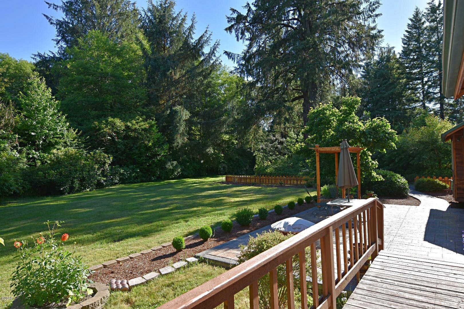 1754 Old River Road Northeast Siletz, OR 97380 - Photo 9 of 42 Deck and Yard