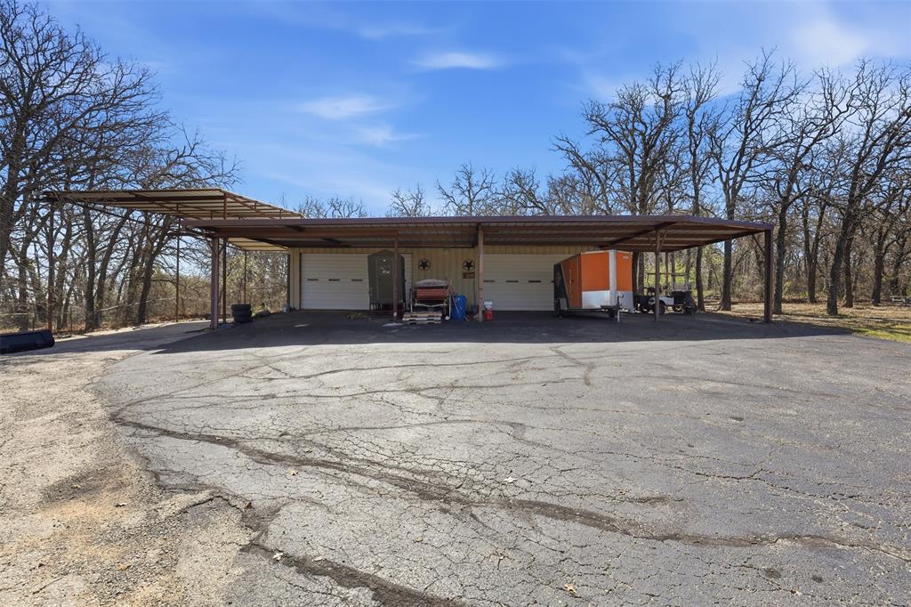 533 Eagles Way Springtown, TX 76082 - Photo 25 of 32 front view of a house with a outdoor space