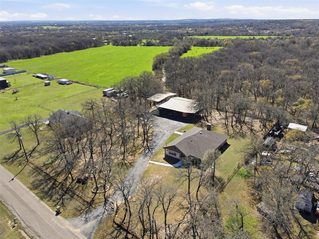 533 Eagles Way Springtown, TX 76082 - Photo 29 of 32 a aerial view of a house with a yard
