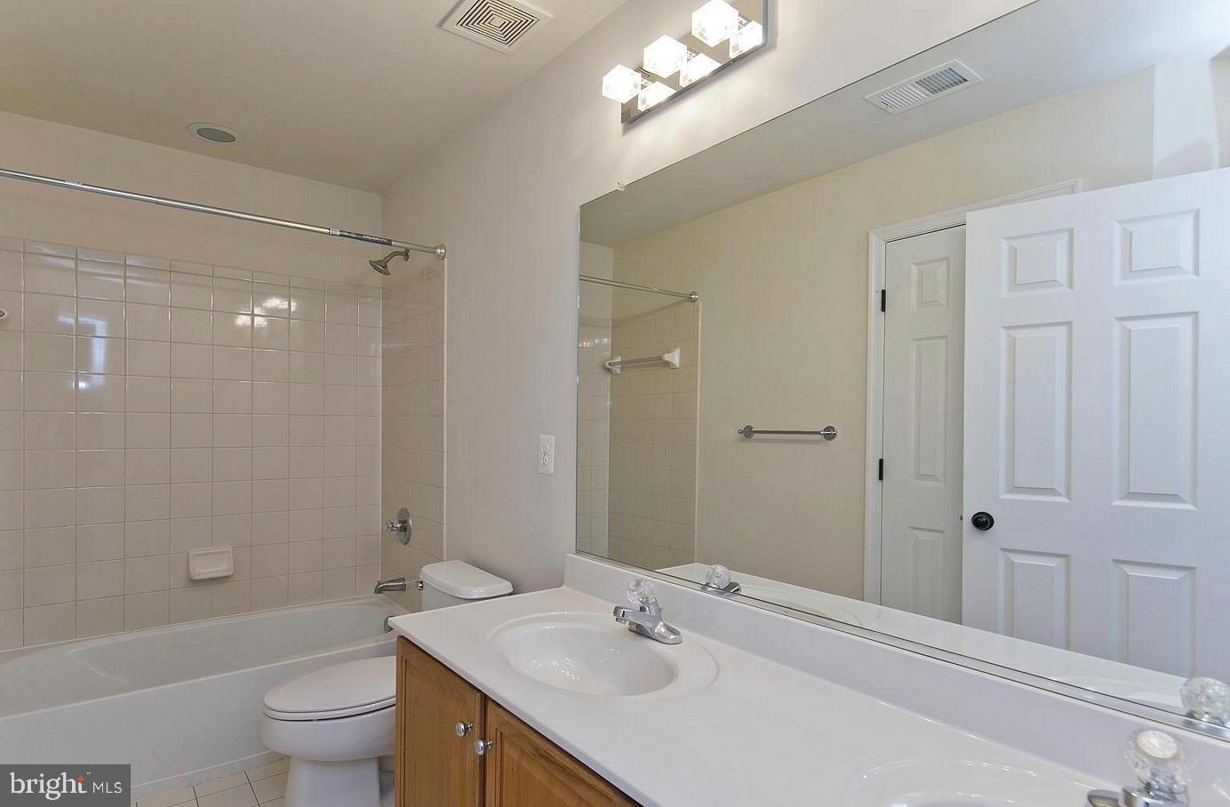 73 Spoon Square Front Royal, VA 22630 - Photo 11 of 28 a bathroom with a sink a toilet and shower