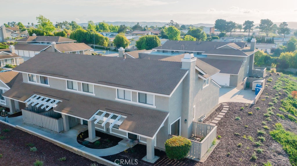 1153 Sumner Place, Unit D Santa Maria, CA 93455 - Photo 31 of 33 an aerial view of a house with garden space and street view
