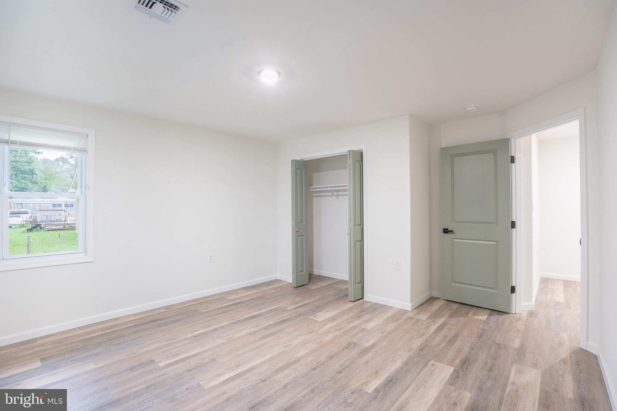 9010 Elks Road Seaford, DE 19973 - Photo 12 of 33 Bright and airy room with modern charm.
