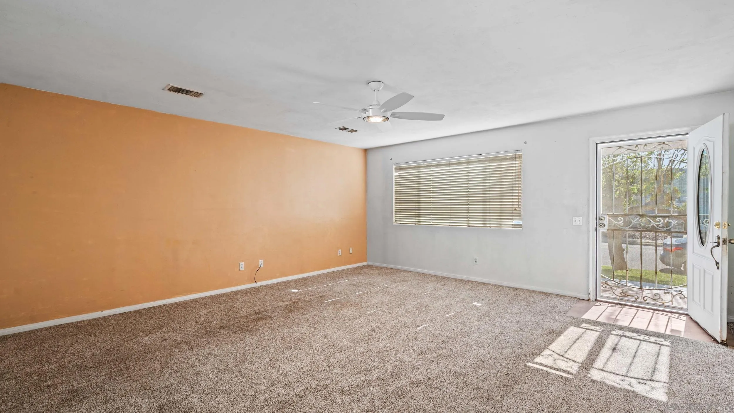 10019 Settle Road Santee, CA 92071 - Photo 16 of 35 a view of an empty room with a window