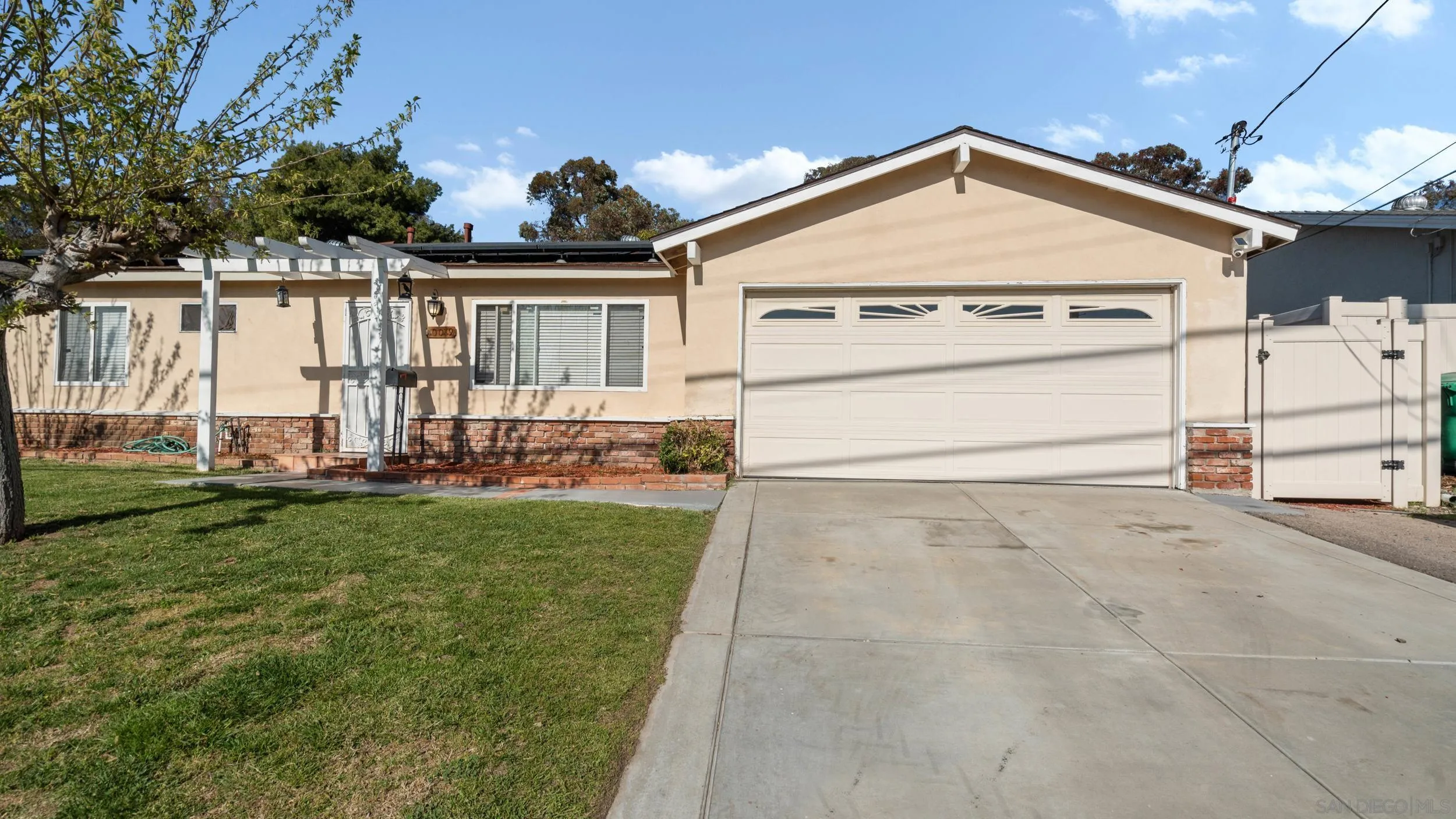 10019 Settle Road Santee, CA 92071 - Photo 3 of 35 a view of front of house with a yard