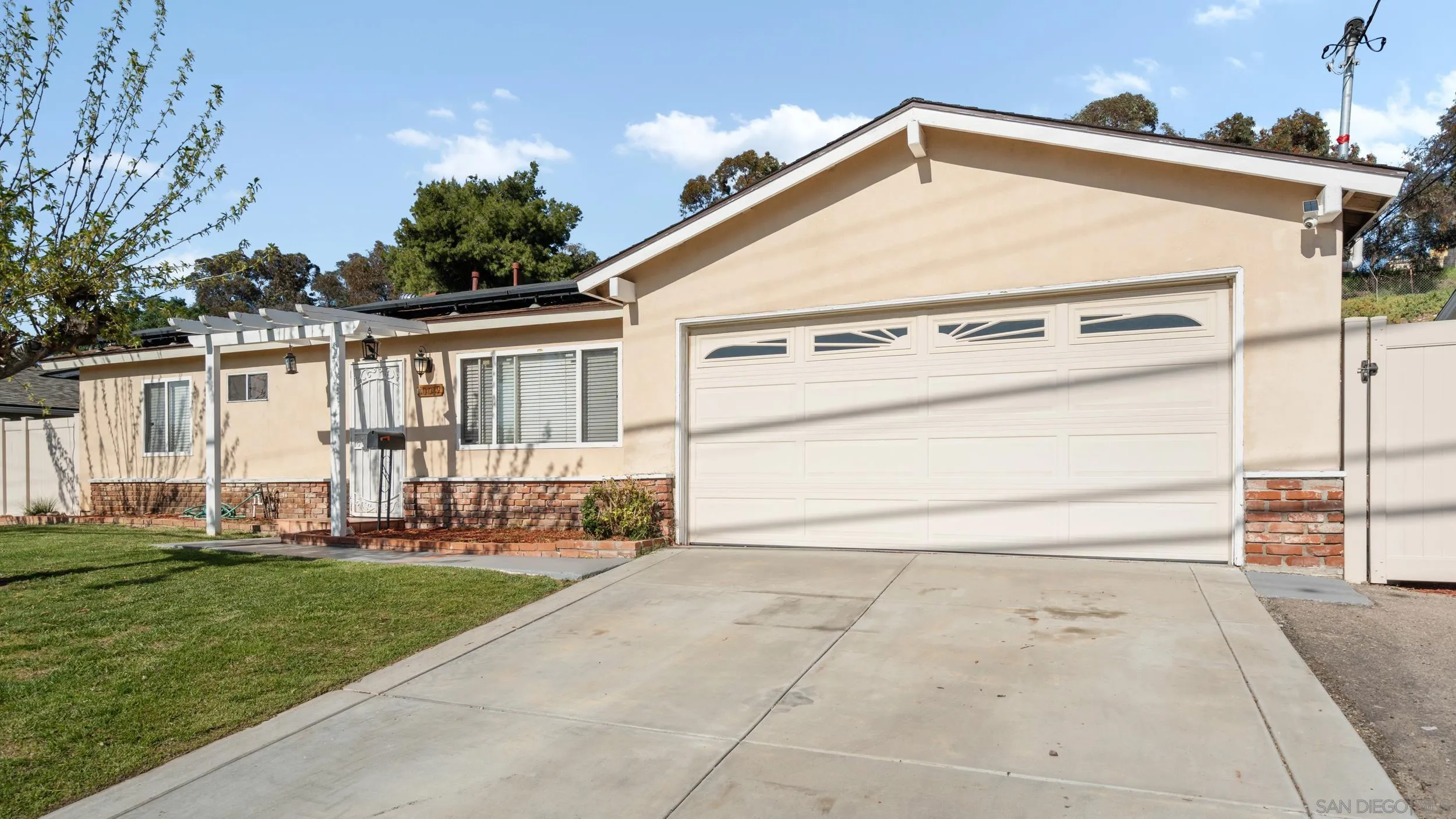 10019 Settle Road Santee, CA 92071 - Photo 4 of 35 a view of backyard of the house