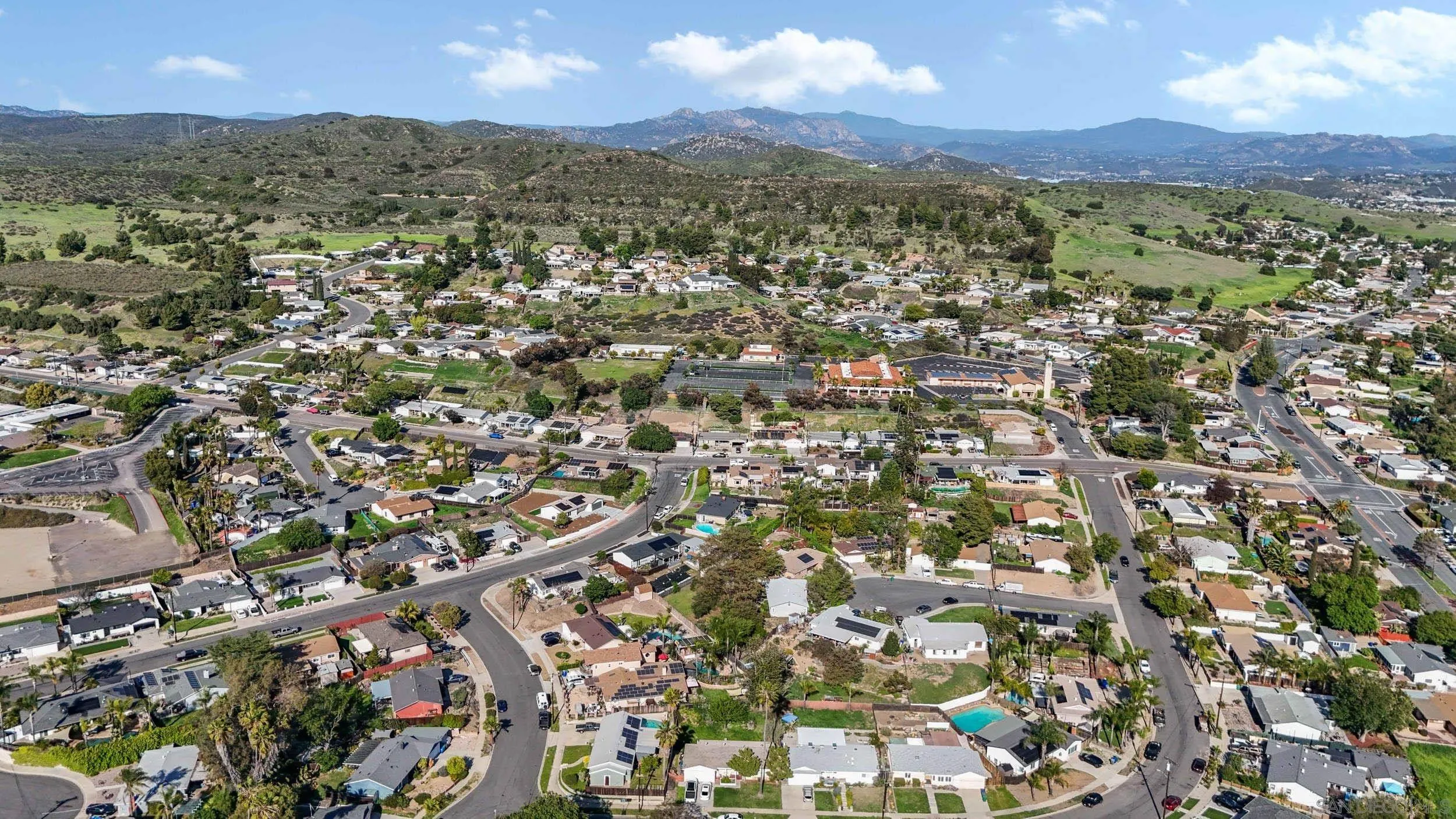 10019 Settle Road Santee, CA 92071 - Photo 10 of 35 an aerial view of residential houses with outdoor space and trees