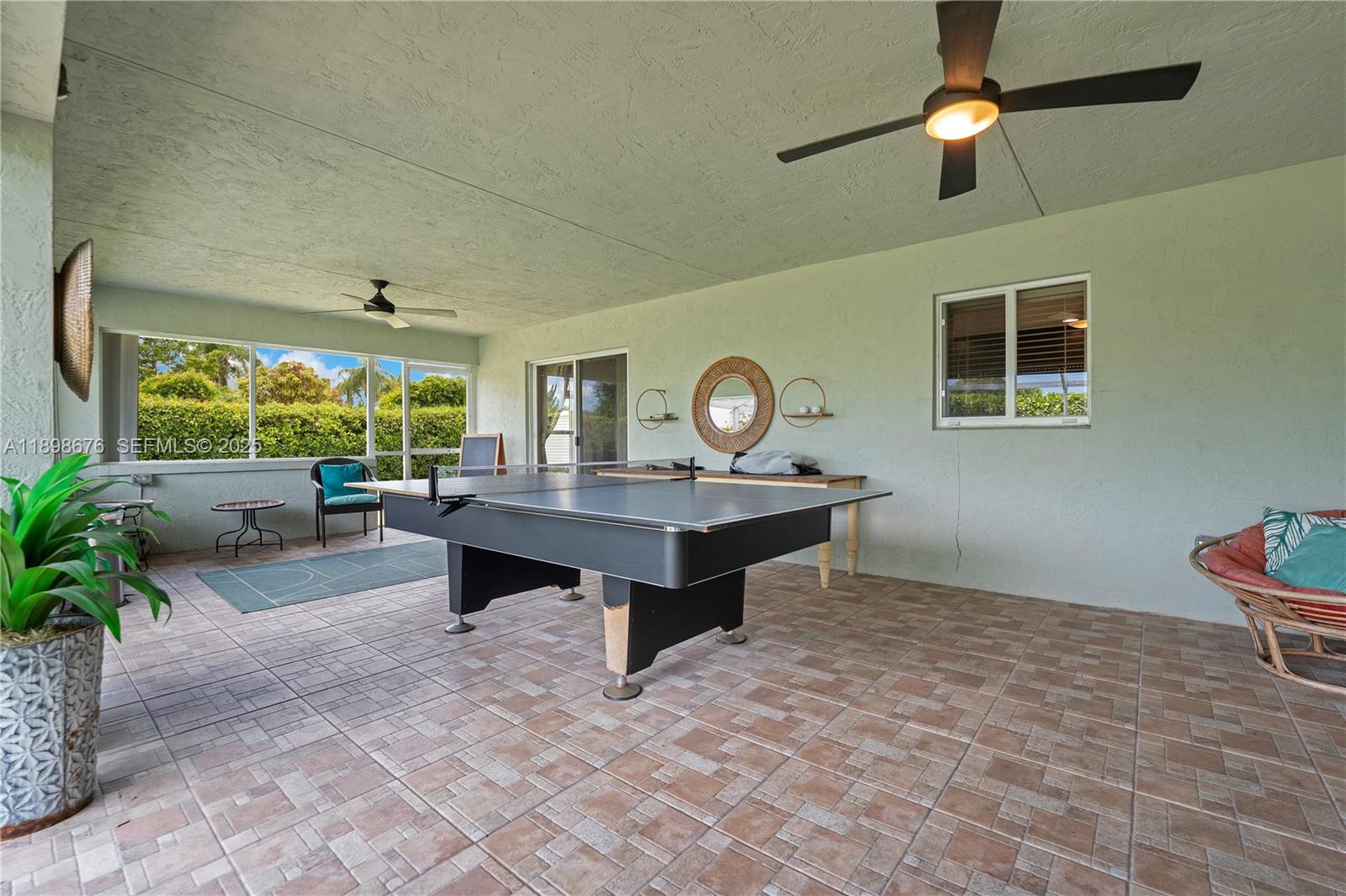 15300 Southwest 164th Street Miami, FL 33187 - Photo 25 of 39 a living room with furniture and a window