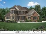4005 Flowering Peach Road, Unit 7 Marvin, NC 28173 - Photo 1 of 1 a front view of a house with a yard