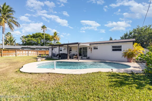 a view of outdoor space yard and swimming pool
