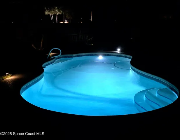a view of a room with a swimming pool