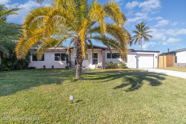 a view of a house with a swimming pool