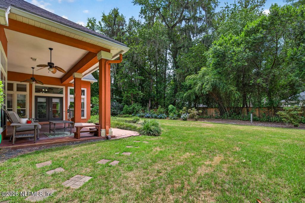 1483 Bridgette Way Fleming Island, FL 32003 - Photo 53 of 63 a view of a house with backyard and sitting area