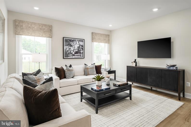 9415 Founders Lane Perry Hall, MD 21128 - Photo 17 of 27 a living room with furniture and a flat screen tv