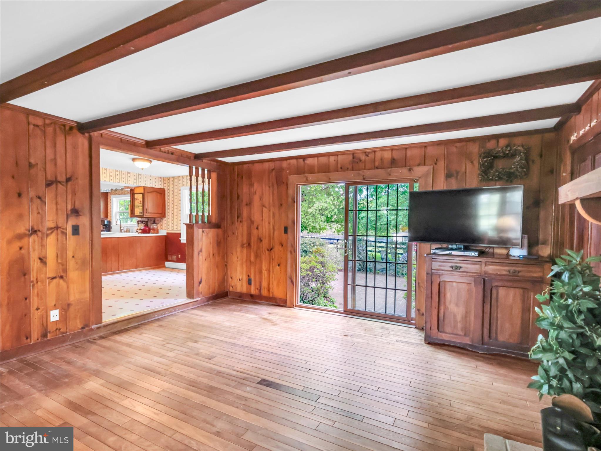 19255 Telegraph Springs Road Purcellville, VA 20132 - Photo 23 of 107 Charming wood-paneled living space.