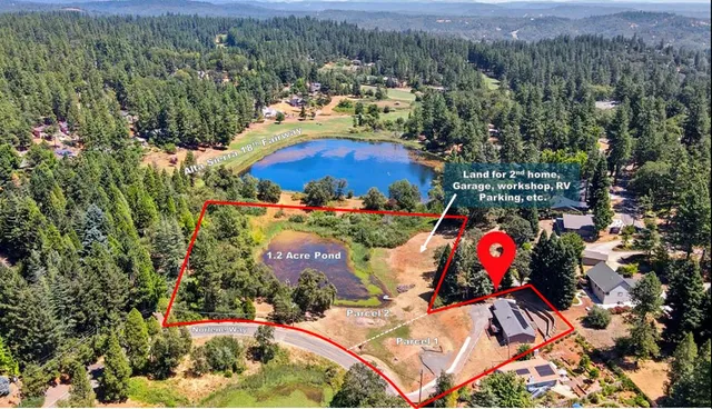 an aerial view of a swimming pool patio and mountain view
