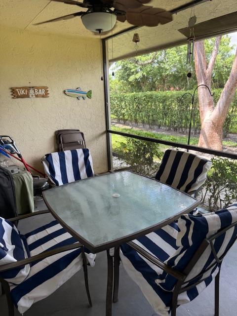 8025 Whispering Palm Drive Boca Raton, FL 33496 - Photo 18 of 27 a view of a dining room with furniture window and outside view