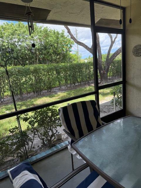 8025 Whispering Palm Drive Boca Raton, FL 33496 - Photo 20 of 27 a view of sitting area in the back yard